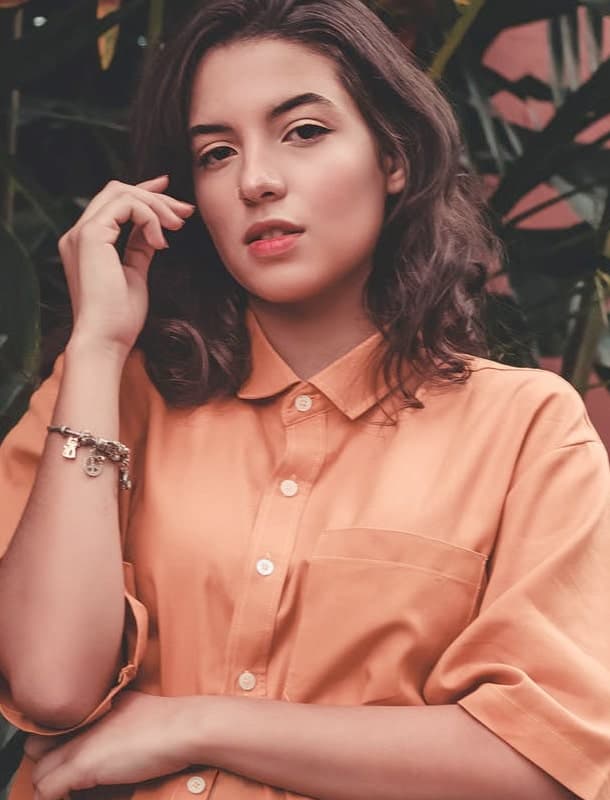 women in orange shirt