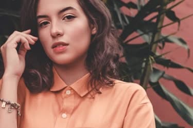 women in orange shirt